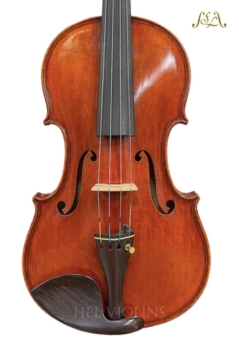 Full view of a polished wooden violin with black fingerboard, bridge, tailpiece, and f-holes, set against a white background.